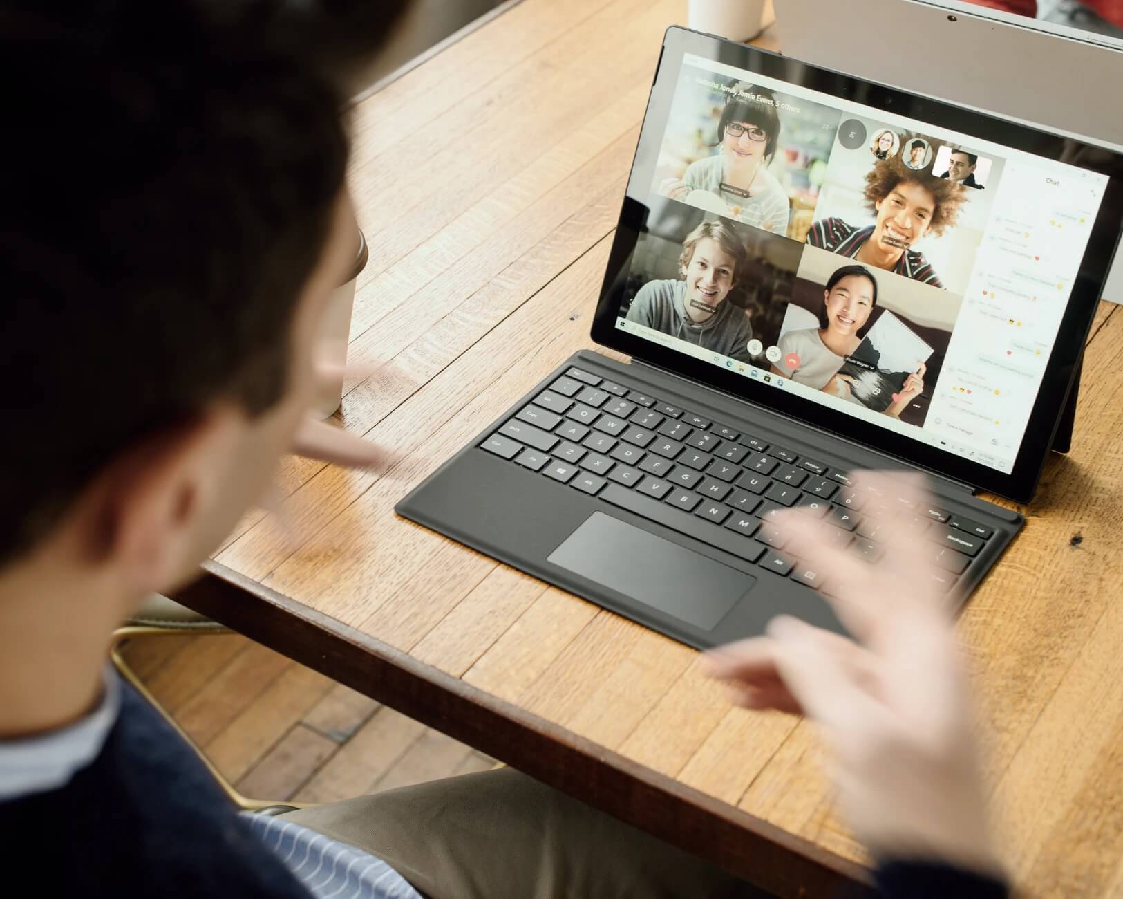 person on group video call